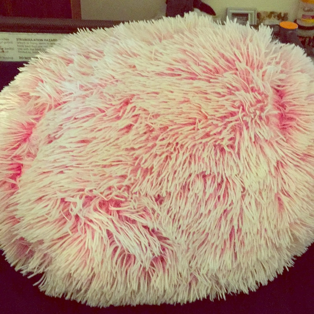 A light pink pillow and very nice to lay with
